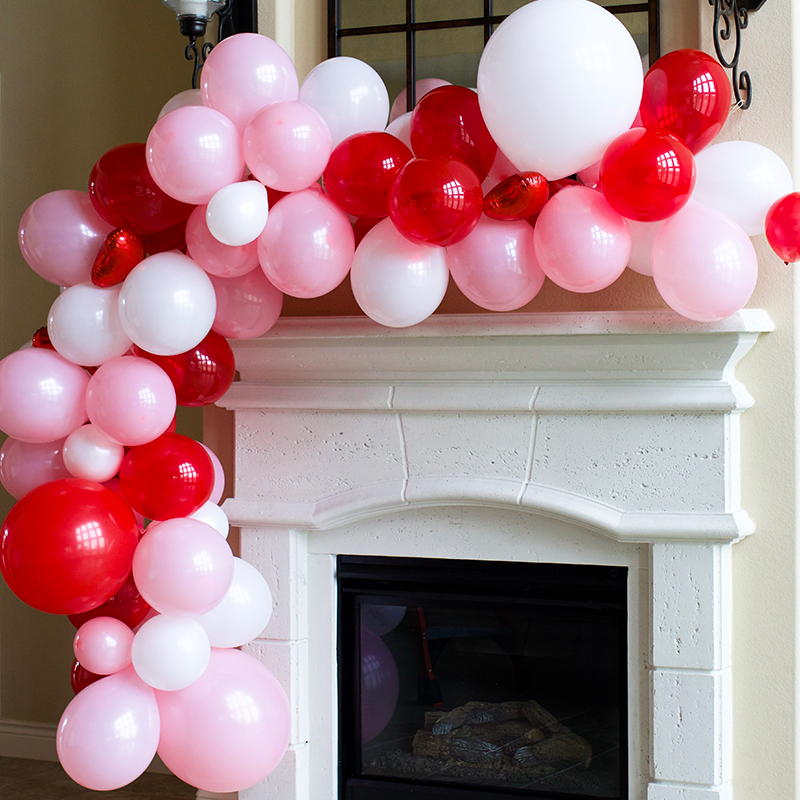 Let's make a super easy balloon garland! We use the fishing line